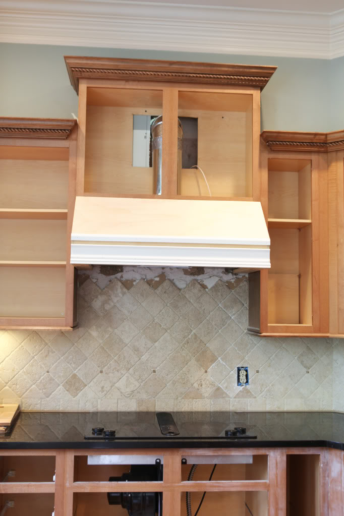 Range hood on sale duct through cabinet