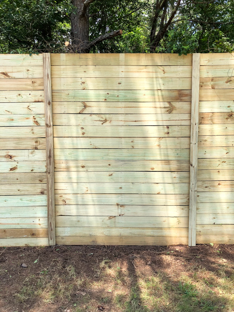 How to Build A Wood Fence On A Chainlink Fence - Bower Power